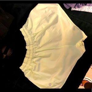 Lululemon bright yellow running shorts